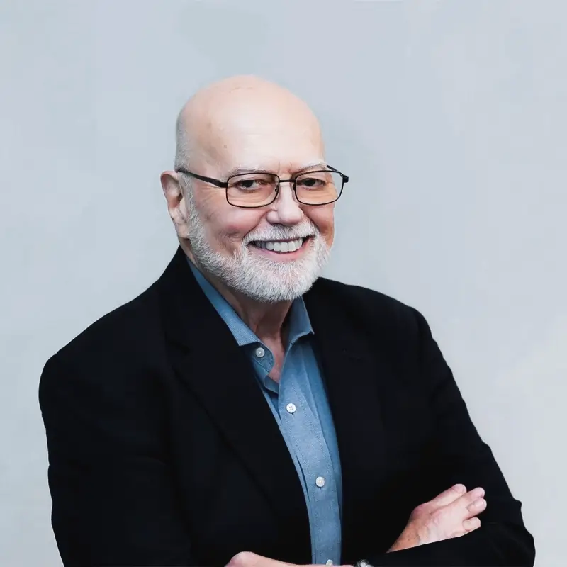 Headshot of Wayne D. Moore, PE, fire protection engineer and author of the article on temporary fire alarm systems.